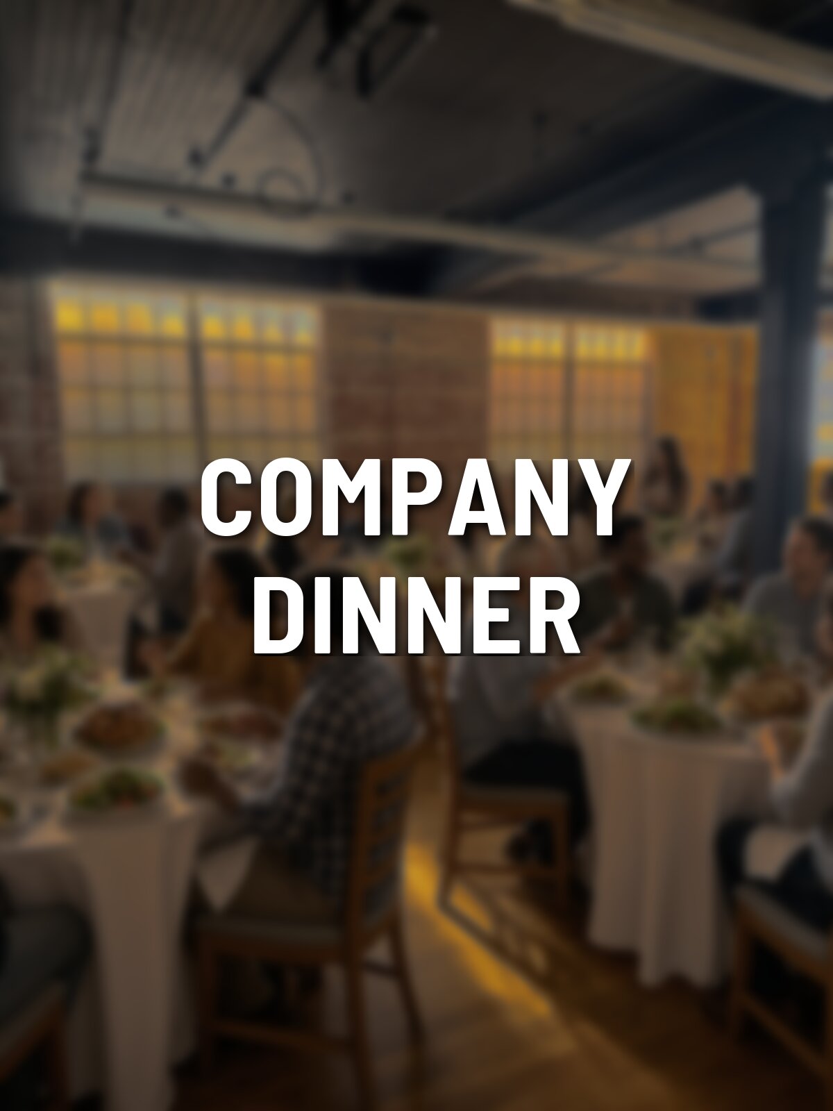 Example of a company dinner in the main hall at Pleasant Street Hall, round tables under the brick wall and tall windows